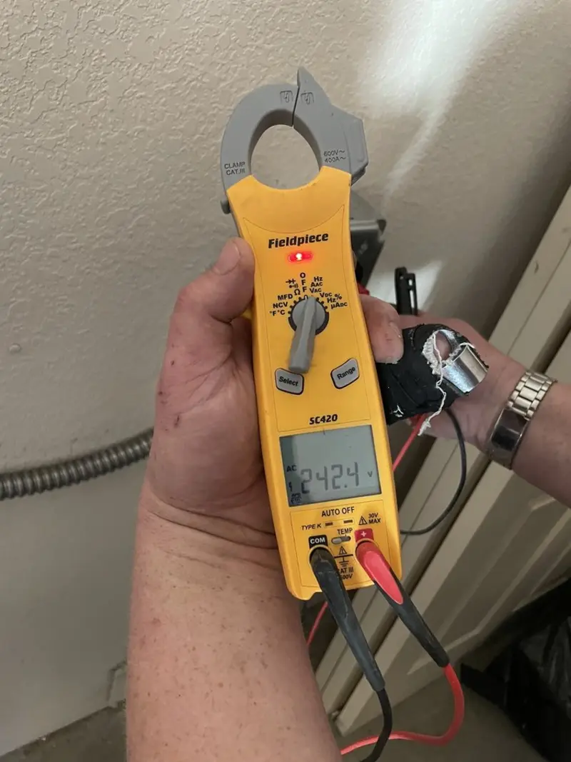 Voltage testing with clamp meter during Generator Installation in Monmouth